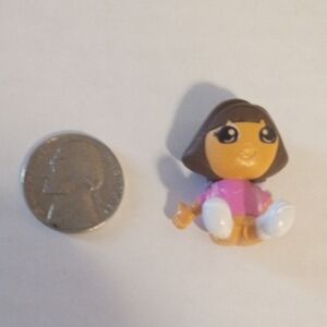 Doll Figure with Pink Outfit